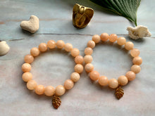Load image into Gallery viewer, Faceted Sherbert Orange Dyed Jade Gemstone Monstera Leaf Charm Bracelet